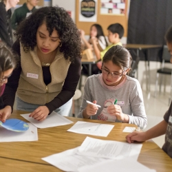 students doing paperwork