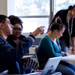 four students in a classroom